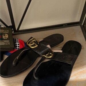 Gucci Black Slides with Gold Buckles
